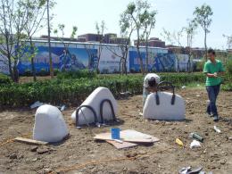 hj1736 石雕—箱包_青島國際服裝城不銹鋼雕塑、石雕、玻璃鋼雕塑_濱州宏景雕塑有限公司